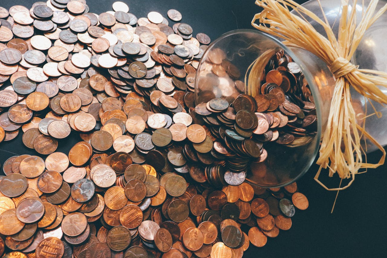 Photo by Pixabay: https://www.pexels.com/photo/copper-colored-coin-lot-259165/